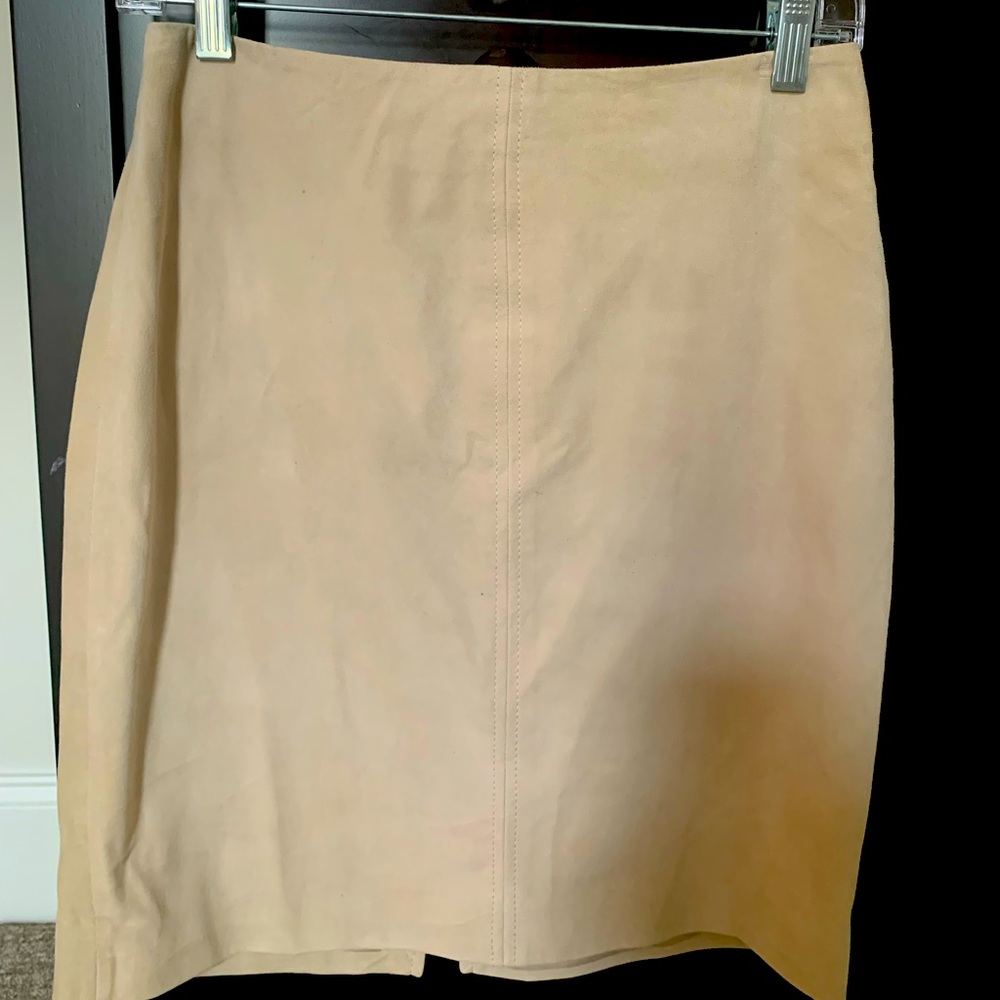 Genuine suede leather skirt. H&M Size 6 and runs small.Never worn.